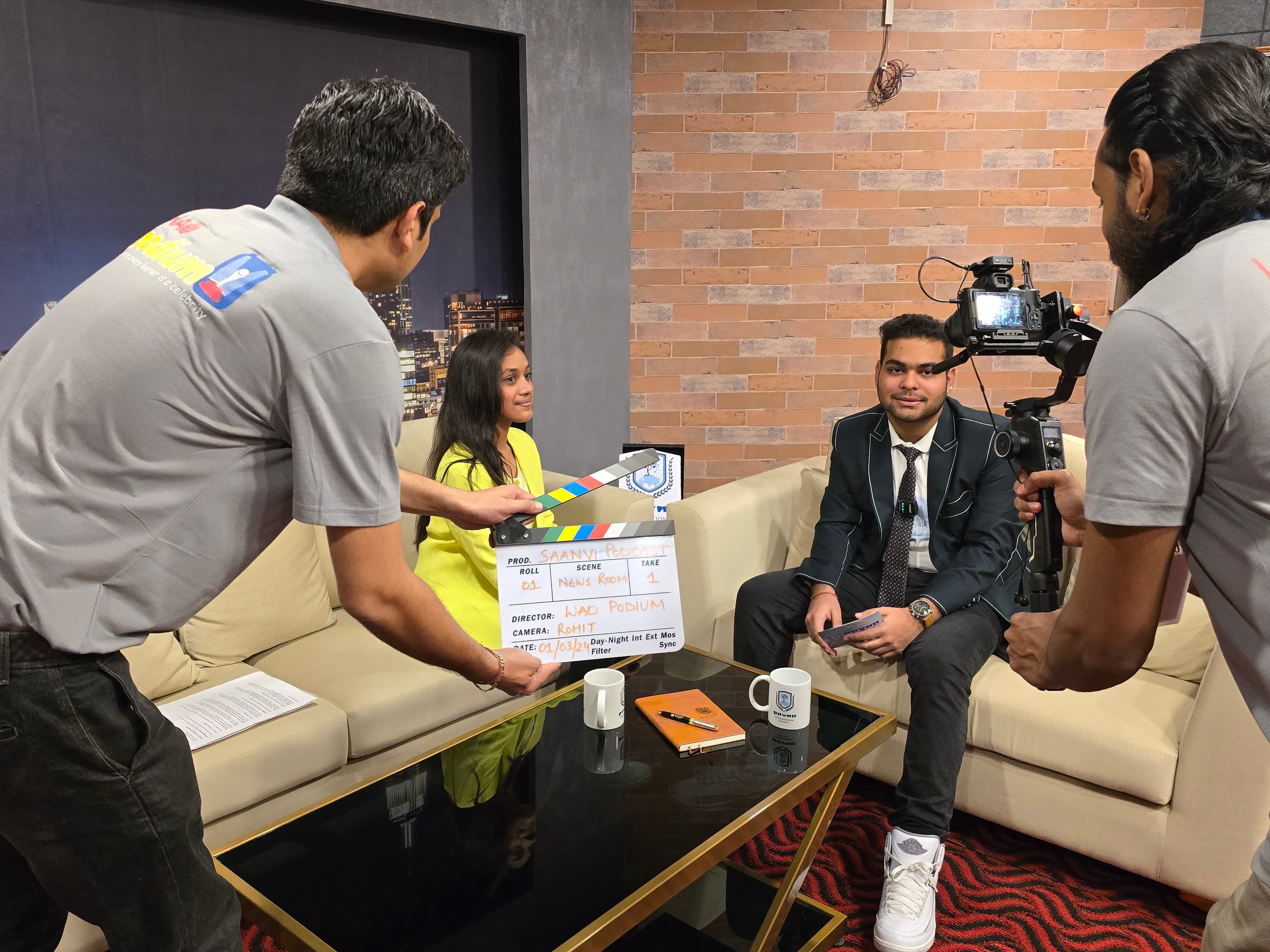 Students and facilitators recording a school podcast